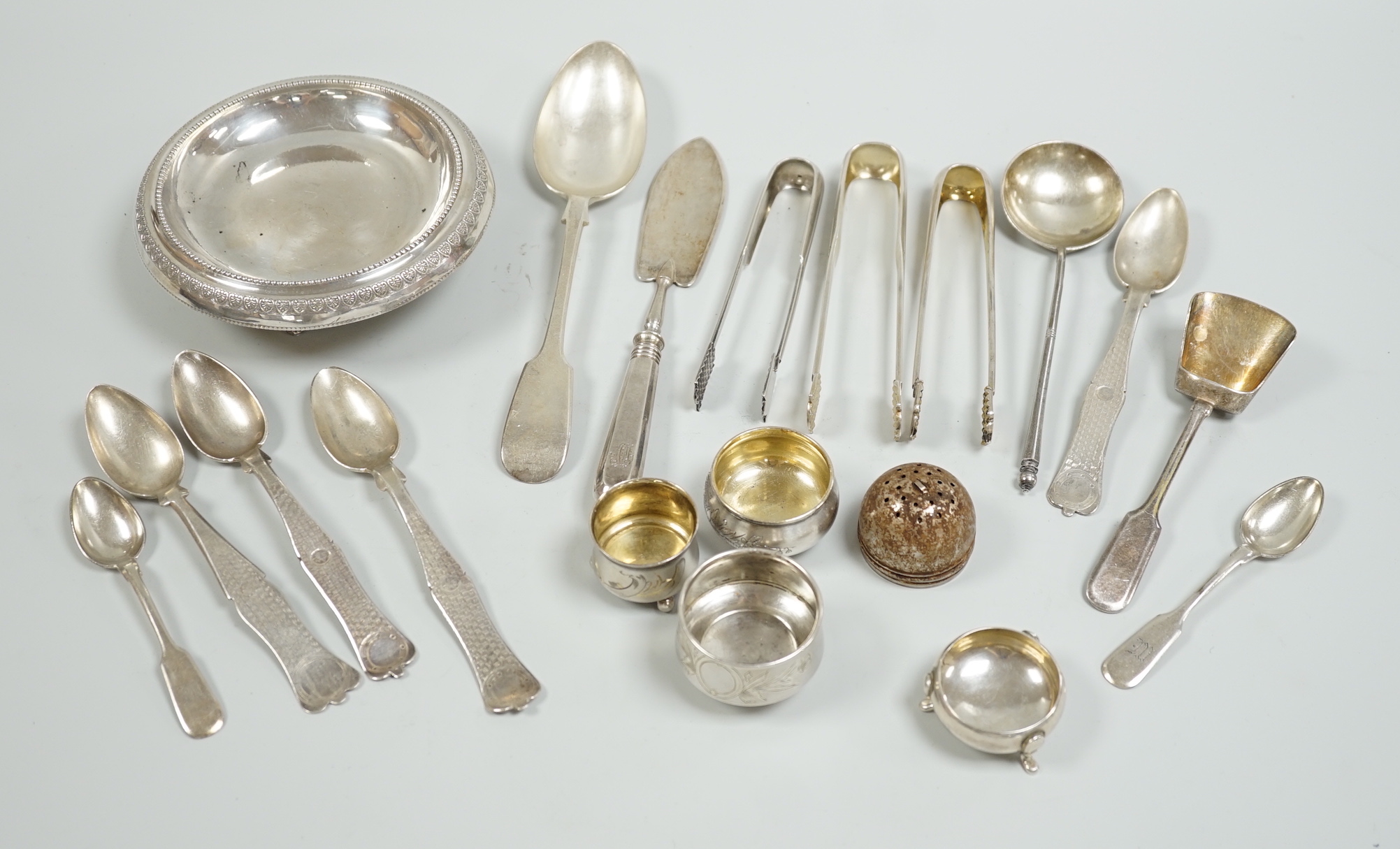 Miscellaneous white metal and plated cutlery including Russian and four small white metal salts including Russian and a plated dish.